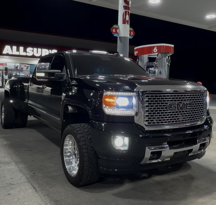 Black lifted GMC Denali dually truck built and serviced by All In Automotive and Diesel
